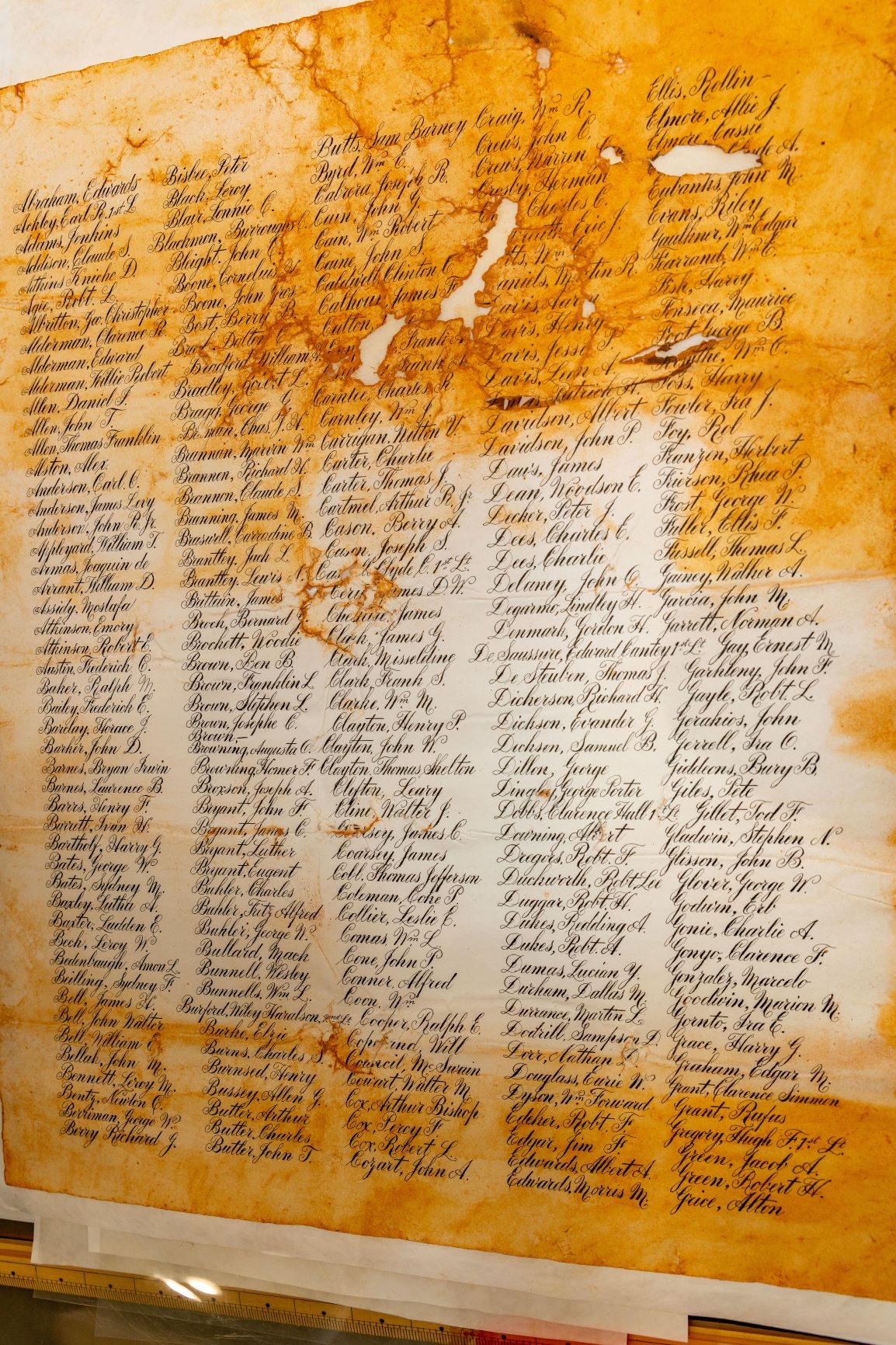 Restored parchment list of war dead.